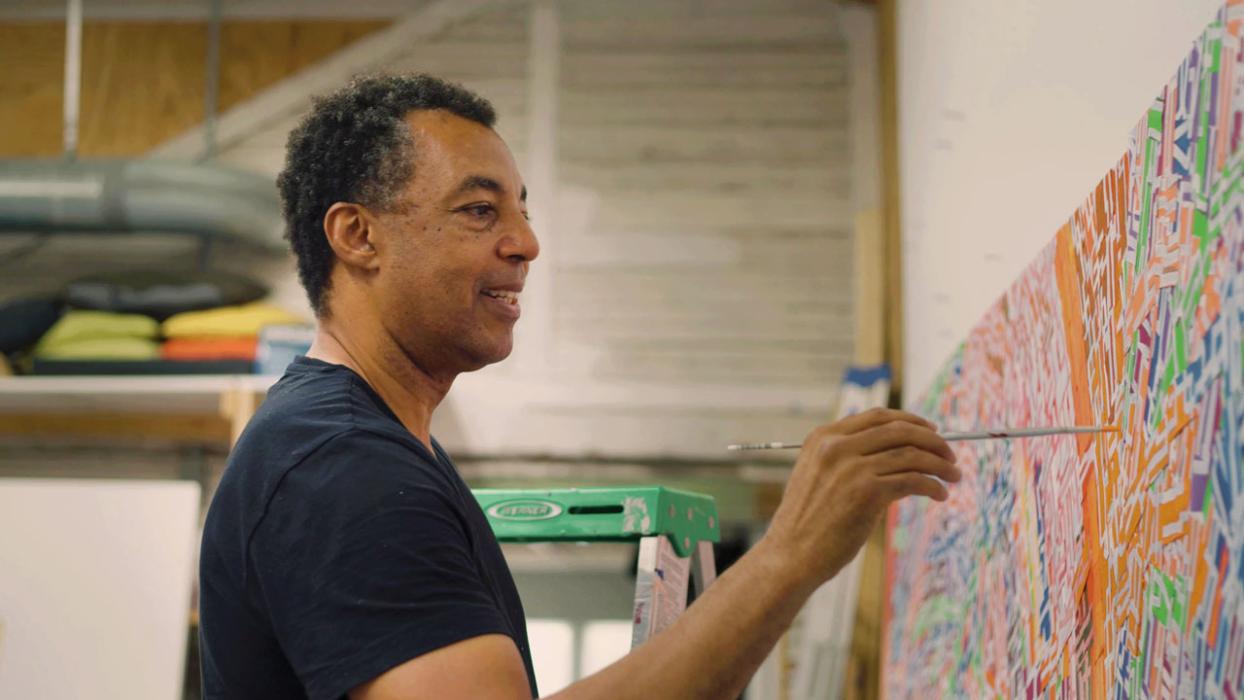 image: Still of Rick Lowe from West to East: Mapping the Unknown