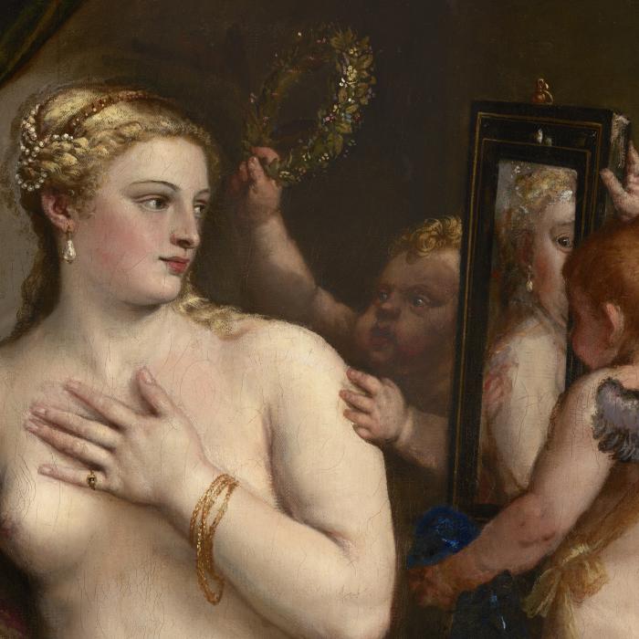 Venus beholds her appearance in a mirror flanked by two cupids